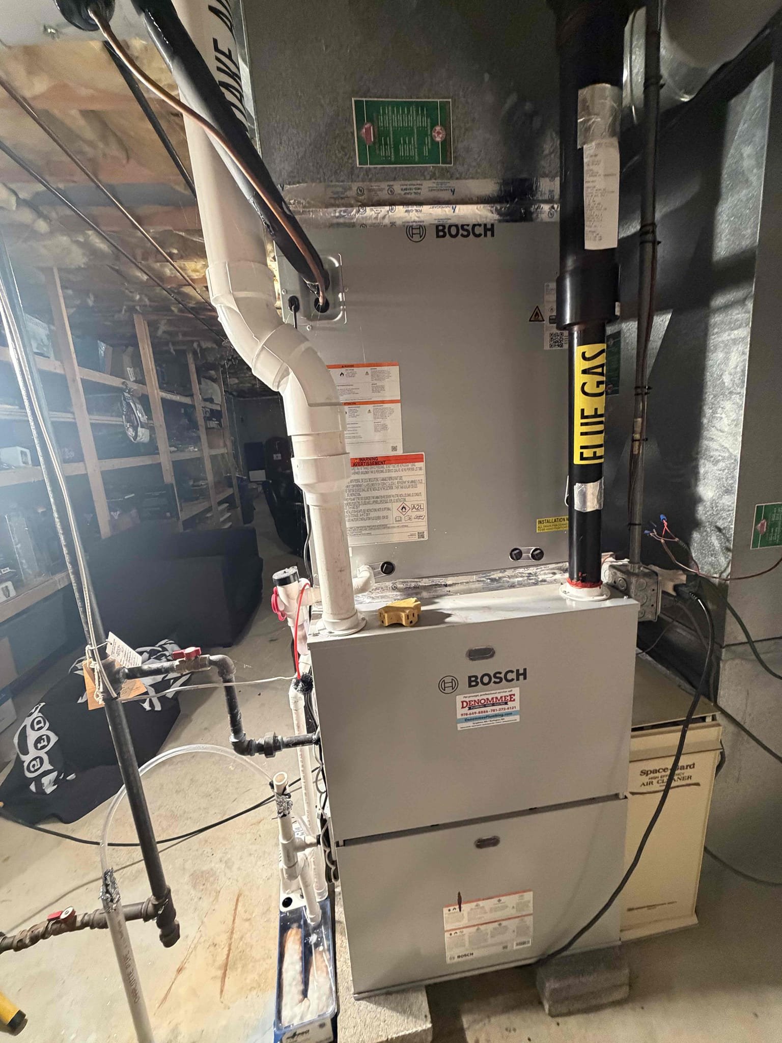 Bosch high efficiency gas furnace and heat pump evaporator coil installed in Tyngsborough Massachusetts